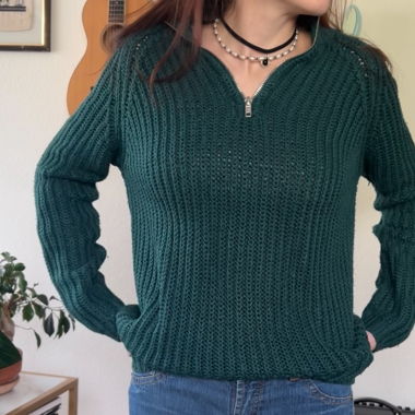 grüner strickpullover