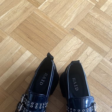 Schwarze Loafers