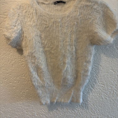 Pull blanc duveteux