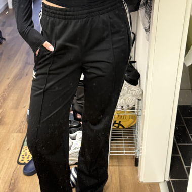 Adidas black training pants with stripes