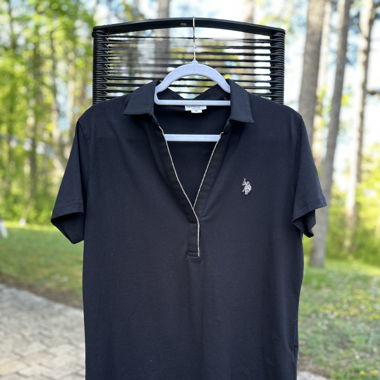 Black polo shirt with golden details