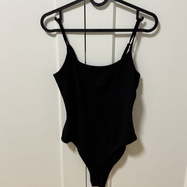 Black bodysuit with spaghetti straps