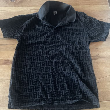 Polo noir à motif