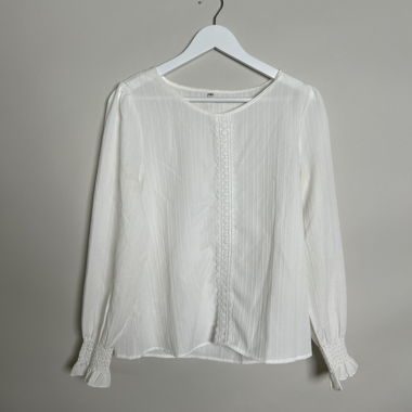 Blouse blanche à volants