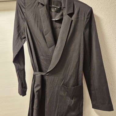 Robe  noire Uli Schneider