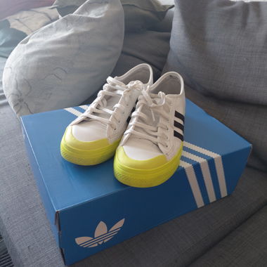 Adidas Nizza white sneakers with yellow sole