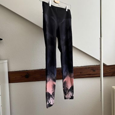 Leggings sportivi neri H&M con stampa rosa