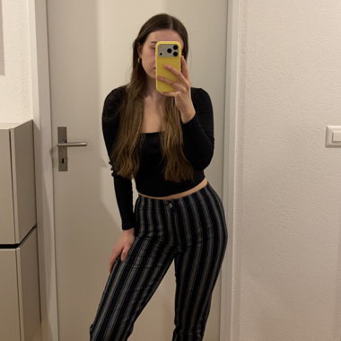 Schwarze gestreifte Hose/Leggings