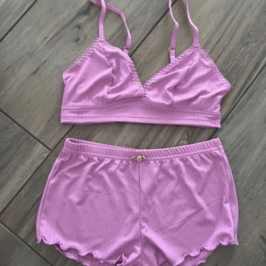 Top e shorts non indossati taglia S