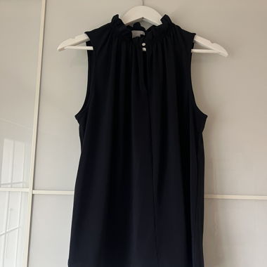 Navy sleeveless blouse
