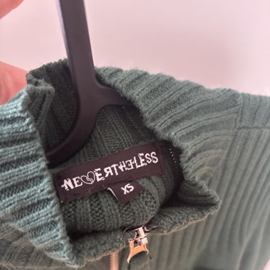 Grünes strickoberteil