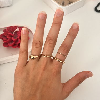 4 Ringe, goldlackiert 