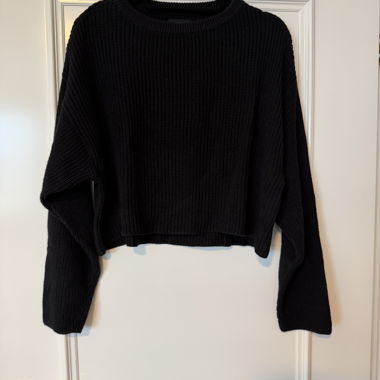 Schwarzer Strickpullover