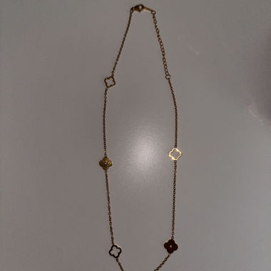 Collana color oro con motivo floreale