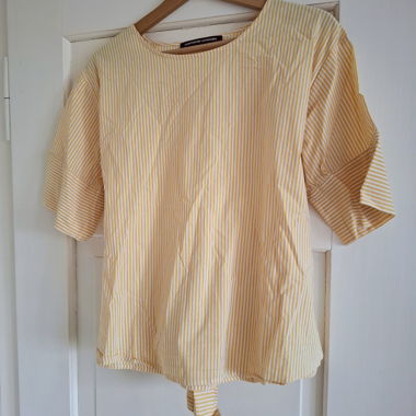 Striped blouse with a bow