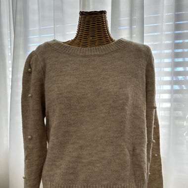 Pull avec des perles 