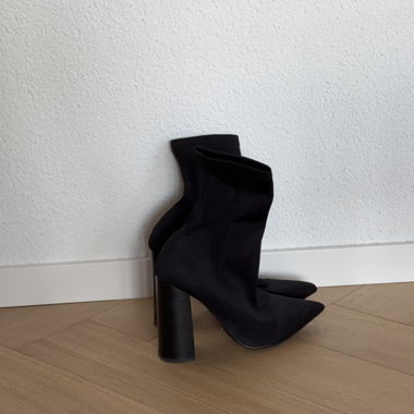 Black stretch boots by Tony Bianco
