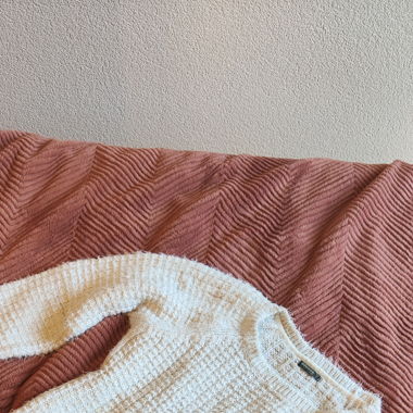 Pull blanc et brillant
