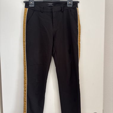 Black pants with yellow stripes (cropped)