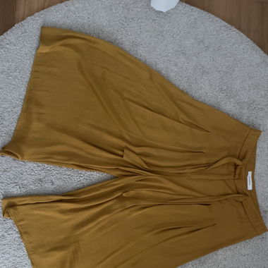 mustard yellow wide-leg pants