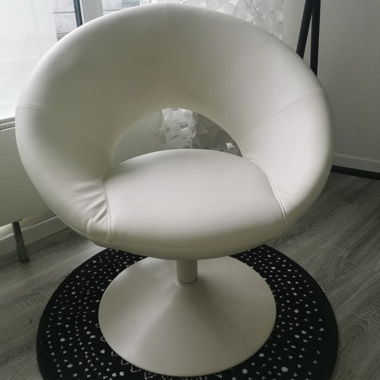 2 White Swivel Armchairs