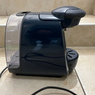Machine à café avec porte-capsules