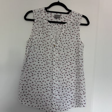 Blouse sans manches à imprimé papillons
