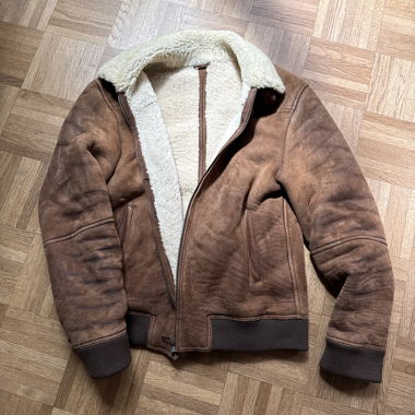 Leather-look jacket with teddy lining