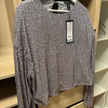 Top con paillettes e maniche lunghe