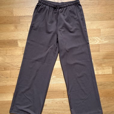 Pantalon ample en tissu de Stradivarius, taille L