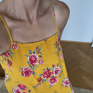 Mustard yellow tank top with roses. H&M