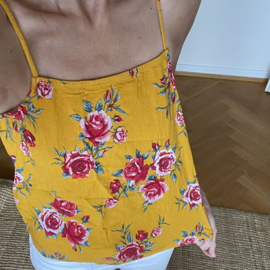 Mustard yellow tank top with roses. H&M