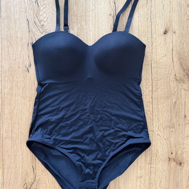 Black lingerie-style bodysuit