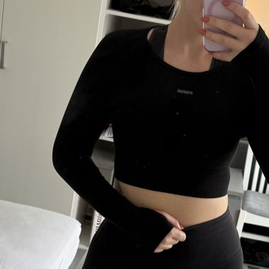 Schwarzes Gymshark Croptop