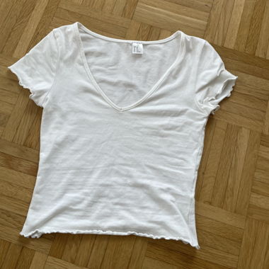 T-shirt bambino bianco con scollo a V