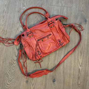 Red leather handbag with fringes
