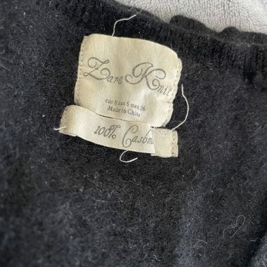 100% cashmere, more like an XS