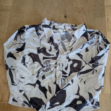Abstract design sheer top