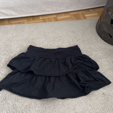 Black ruffle skirt