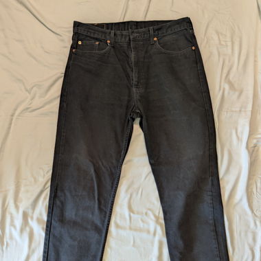 Jean noir Levi’s Strauss & Co T.36-34 comme neuf