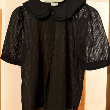 Schwarze transparente Bluse