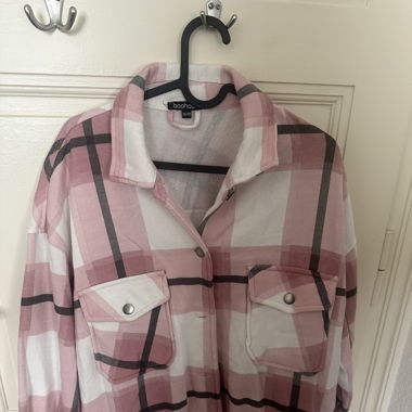 Veste à carreaux rose 