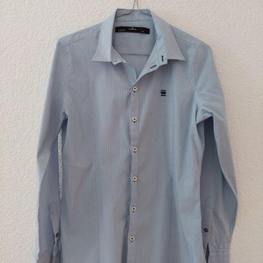 Blusa a righe fini di alta qualità