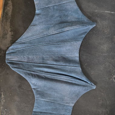 Top corsetto look denim con zip