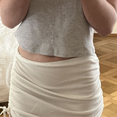 white skirt with bows