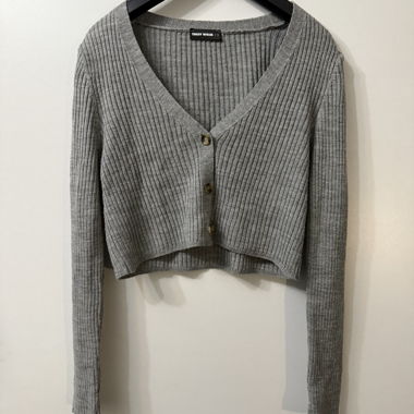 Maglia grigia a maniche lunghe