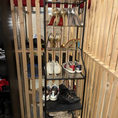 Black shoe rack with glass shelves