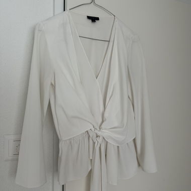 White wrap blouse with tie belt