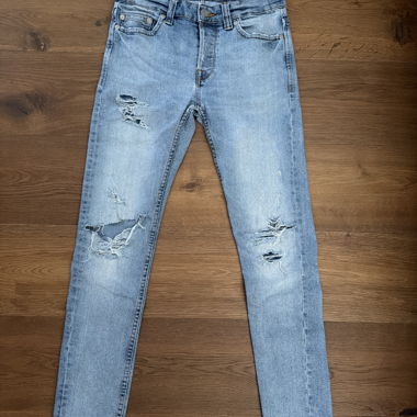 Jeans slim azzurri scoloriti