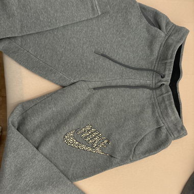 Graue Nike Jogginghose mit Logo